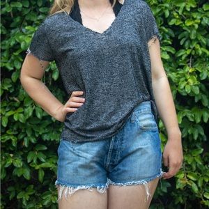 Urban Outfitters-  loose fitting t-shirt with distressed/ frayed edges